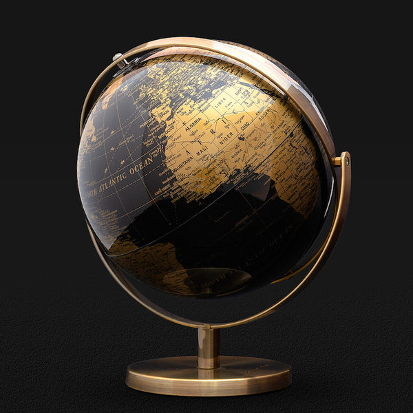 Globe terrestre noir et doré finition brillante, à double axe directionnel, sur pied en métal brossé. Idée cadeau homme.